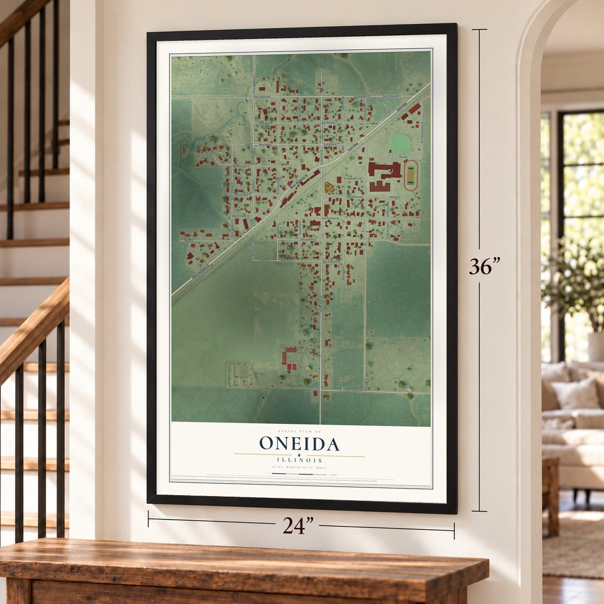 Oneida, Illinois map, 24 x 36 inch print in a black frame by a staircase
