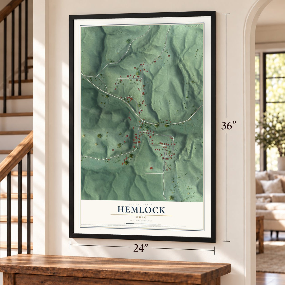 Hemlock, Ohio map, 24 x 36 inch print in a black frame by a staircase