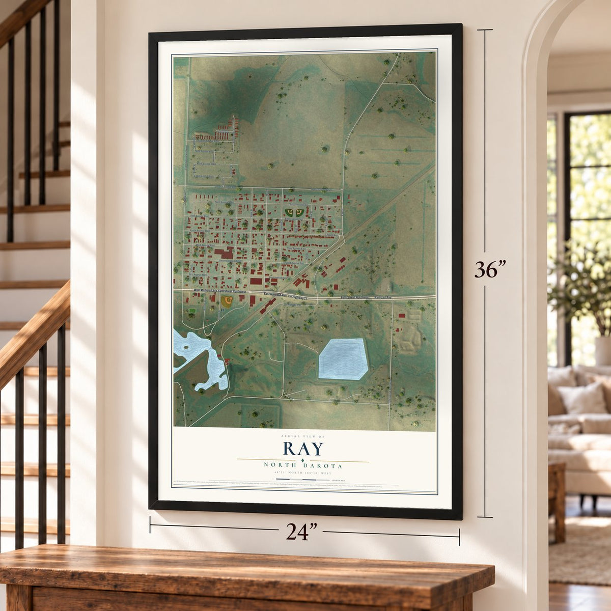 Ray, North Dakota map, 24 x 36 inch print in a black frame by a staircase