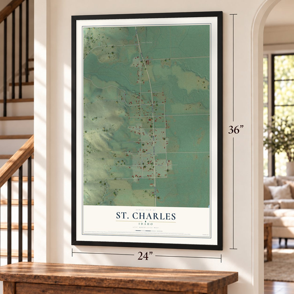 St. Charles, Idaho map, 24 x 36 inch print in a black frame by a staircase