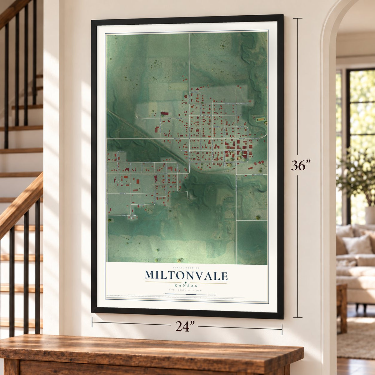 Miltonvale, Kansas map, 24 x 36 inch print in a black frame by a staircase