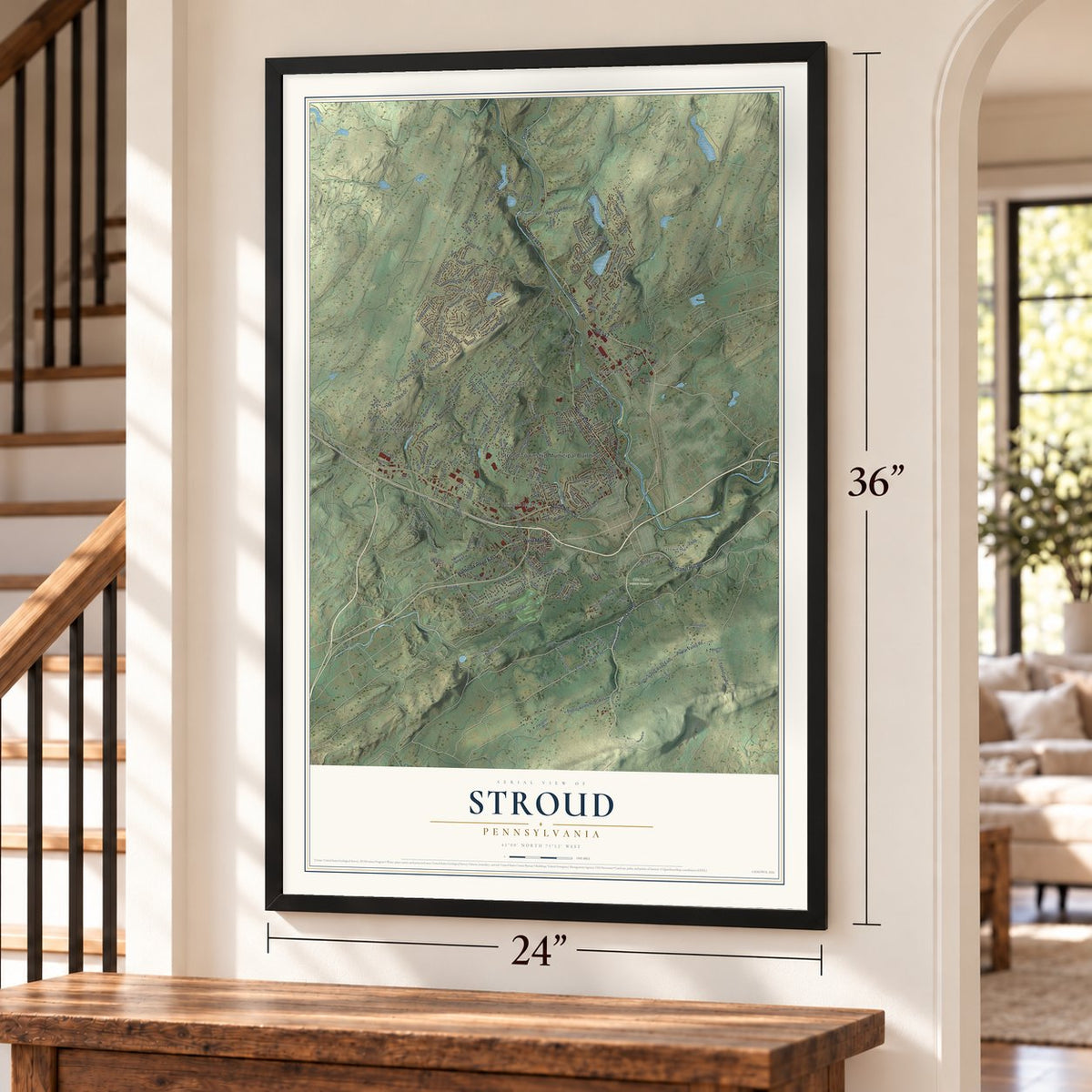 Stroud, Pennsylvania map, 24 x 36 inch print in a black frame by a staircase