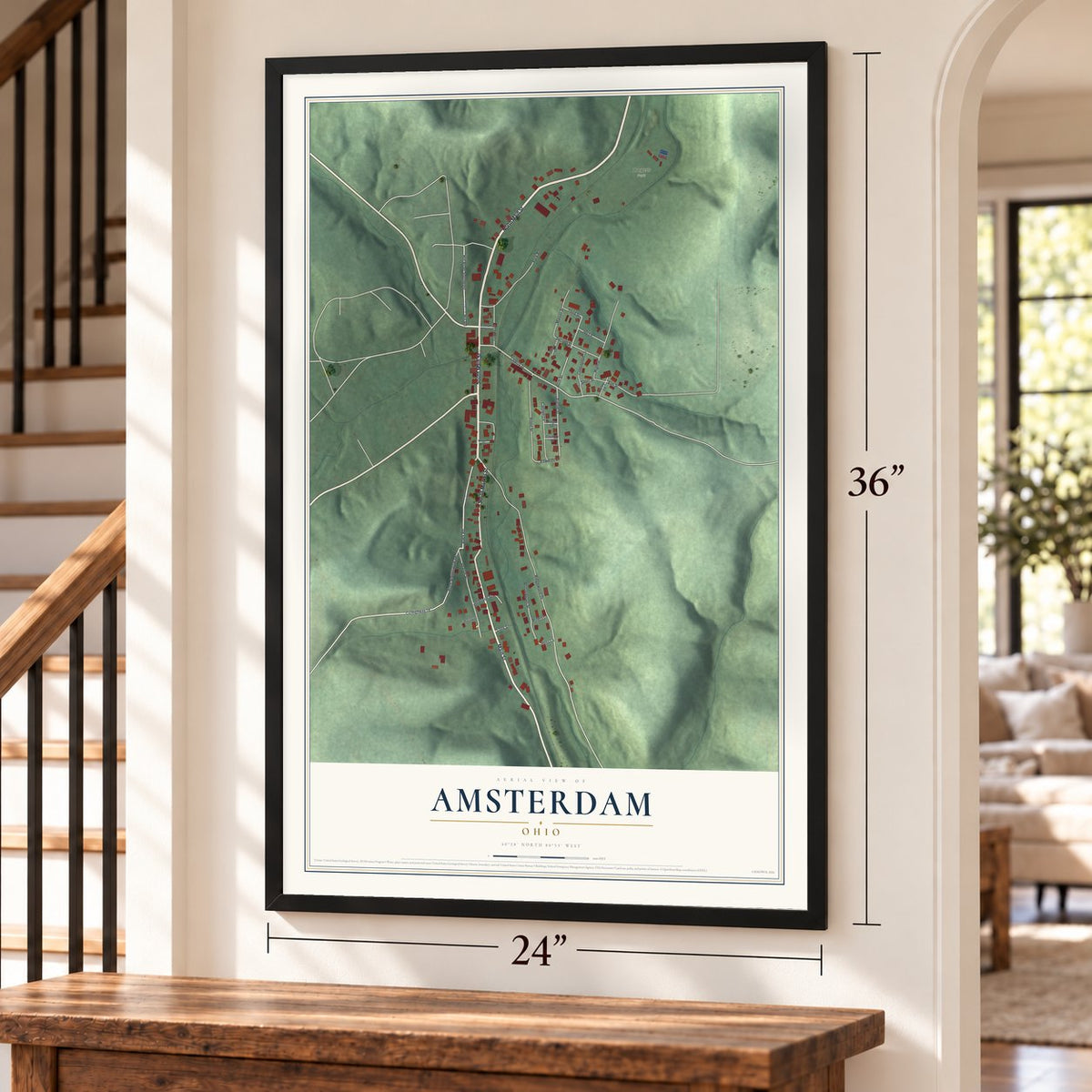 Amsterdam, Ohio map, 24 x 36 inch print in a black frame by a staircase
