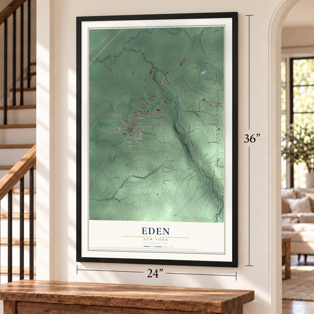 Eden, New York map, 24 x 36 inch print in a black frame by a staircase