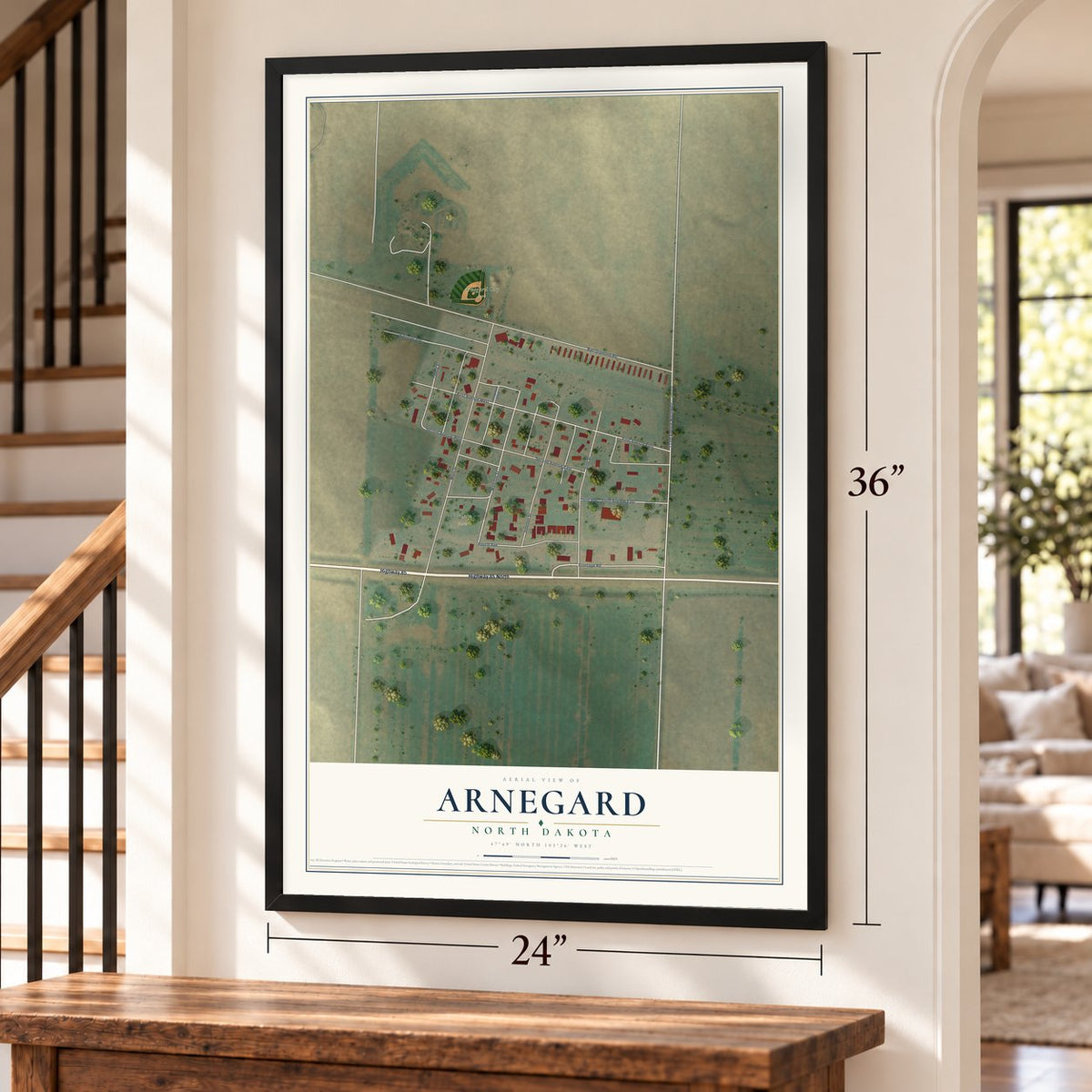 Arnegard, North Dakota map, 24 x 36 inch print in a black frame by a staircase