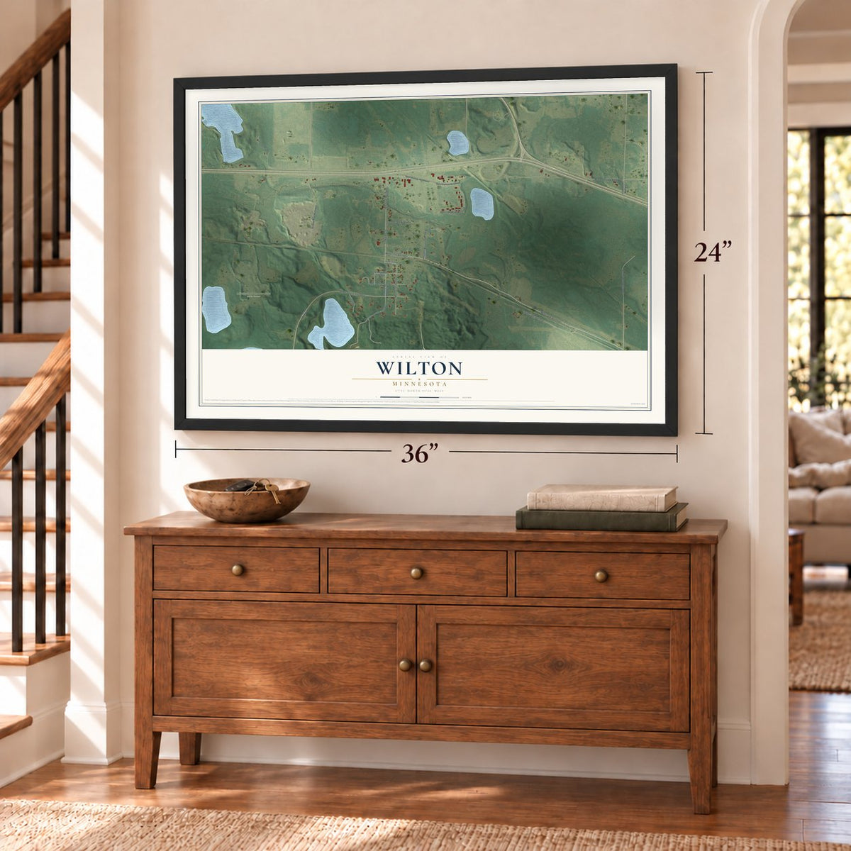 Wilton, Minnesota map, 24 x 36 inch print in a black frame above a dresser by a staircase
