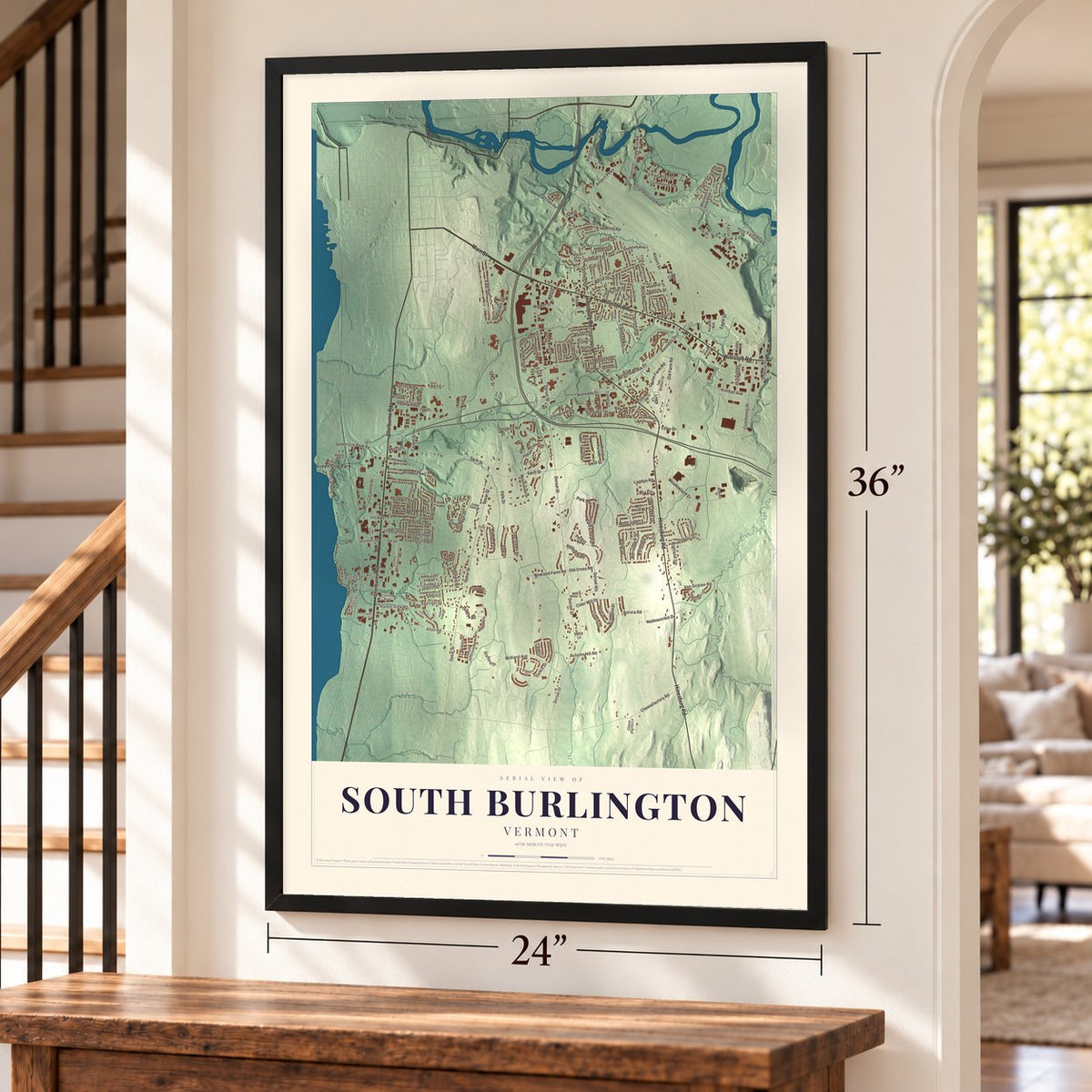 South Burlington, Vermont map, 24 x 36 inch print in a black frame by a staircase