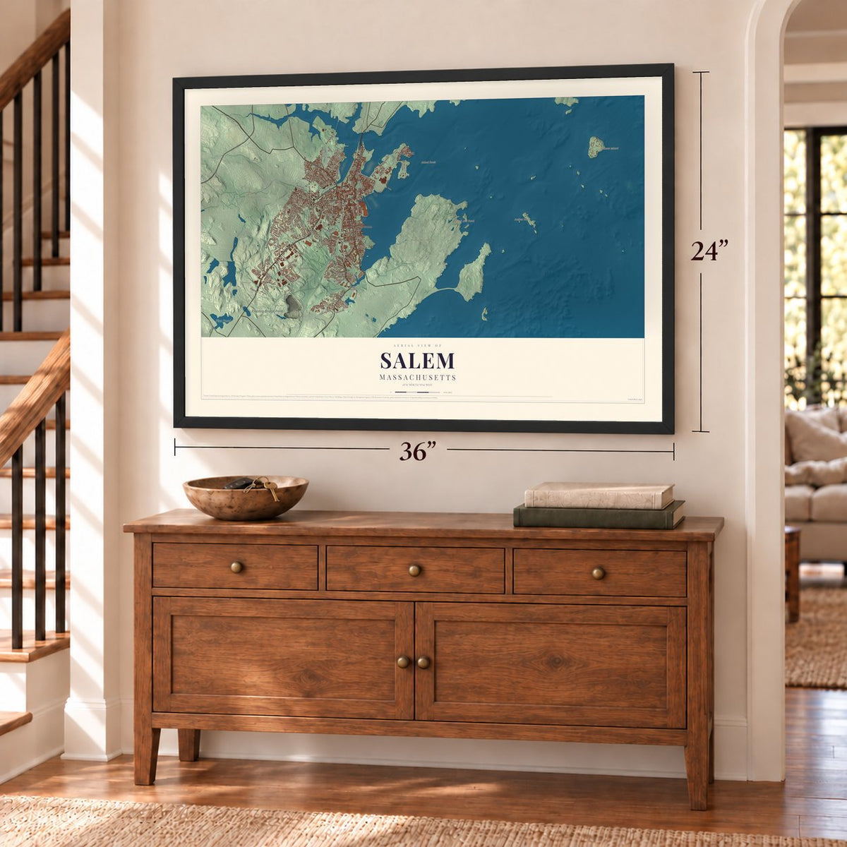 Salem, Massachusetts map, 24 x 36 inch print in a black frame above a dresser by a staircase