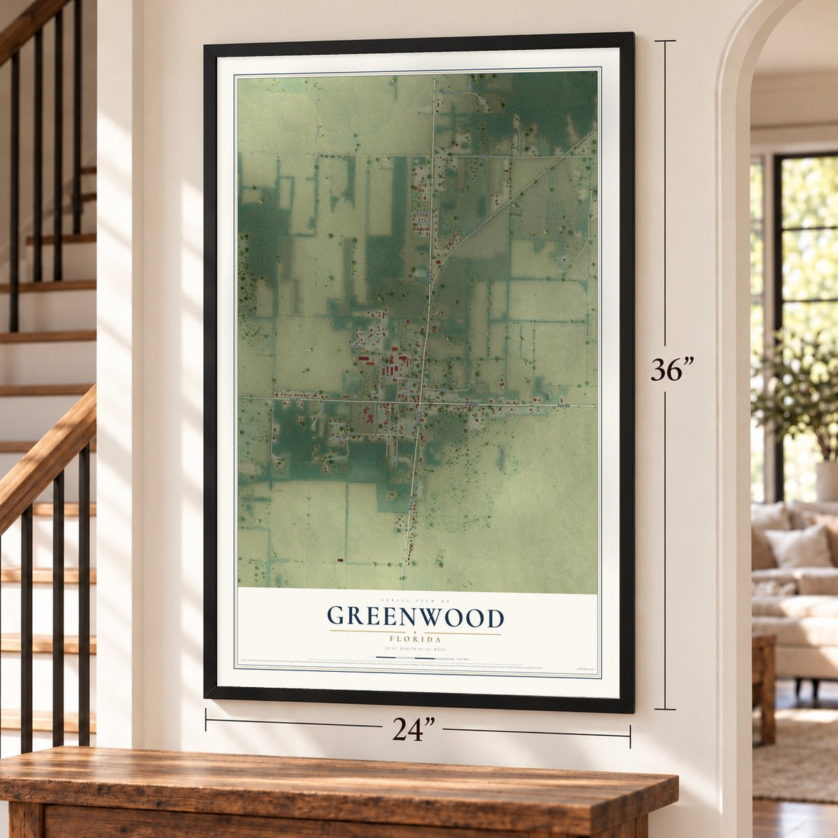 Greenwood, Florida map, 24 x 36 inch print in a black frame by a staircase