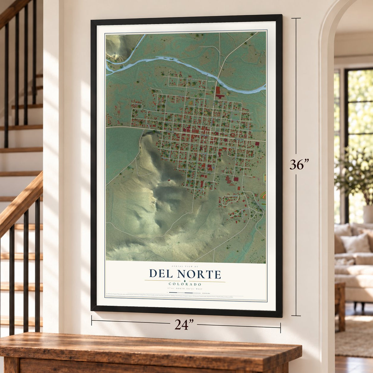 Del Norte, Colorado map, 24 x 36 inch print in a black frame by a staircase