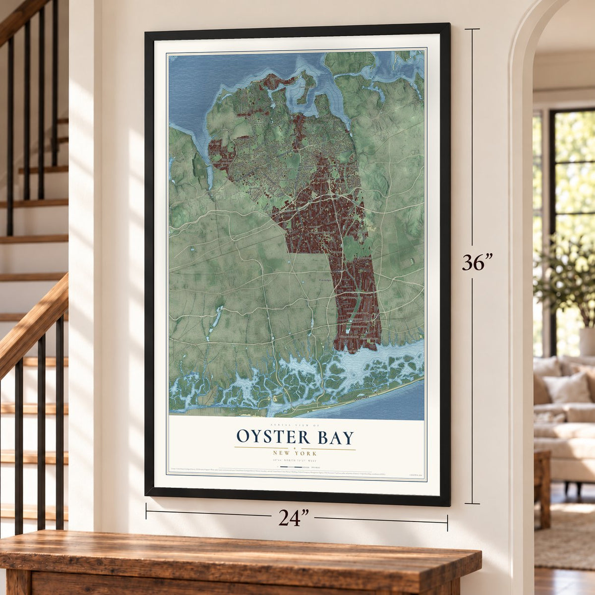 Oyster Bay, New York map, 24 x 36 inch print in a black frame by a staircase