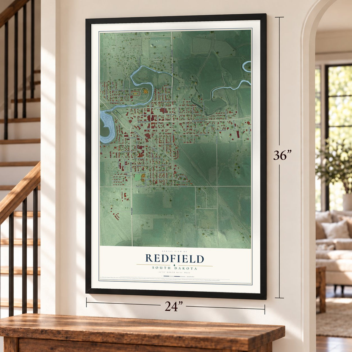 Redfield, South Dakota map, 24 x 36 inch print in a black frame by a staircase
