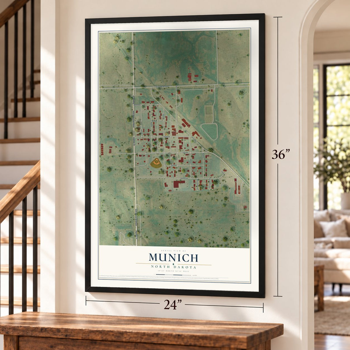 Munich, North Dakota map, 24 x 36 inch print in a black frame by a staircase