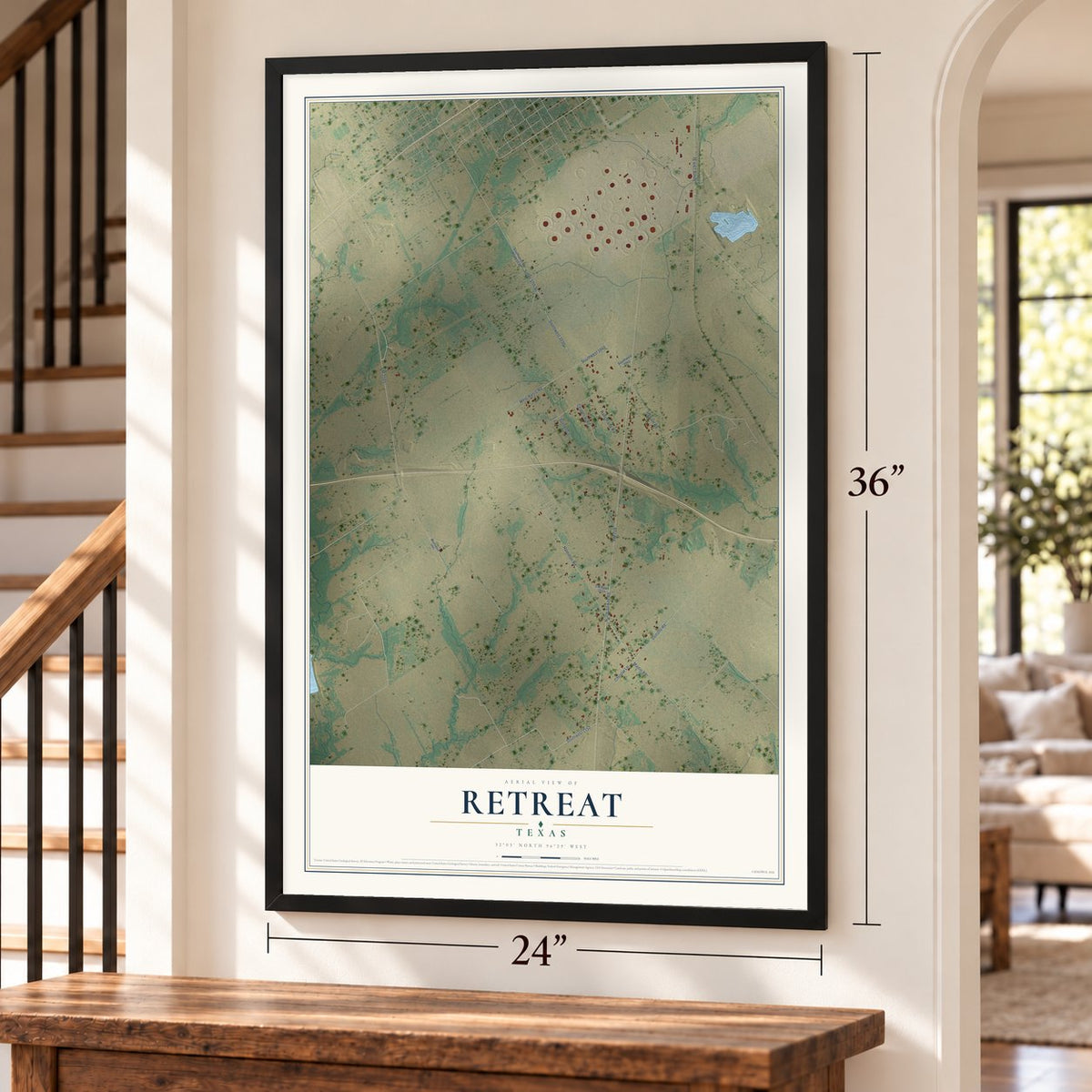 Retreat, Texas map, 24 x 36 inch print in a black frame by a staircase