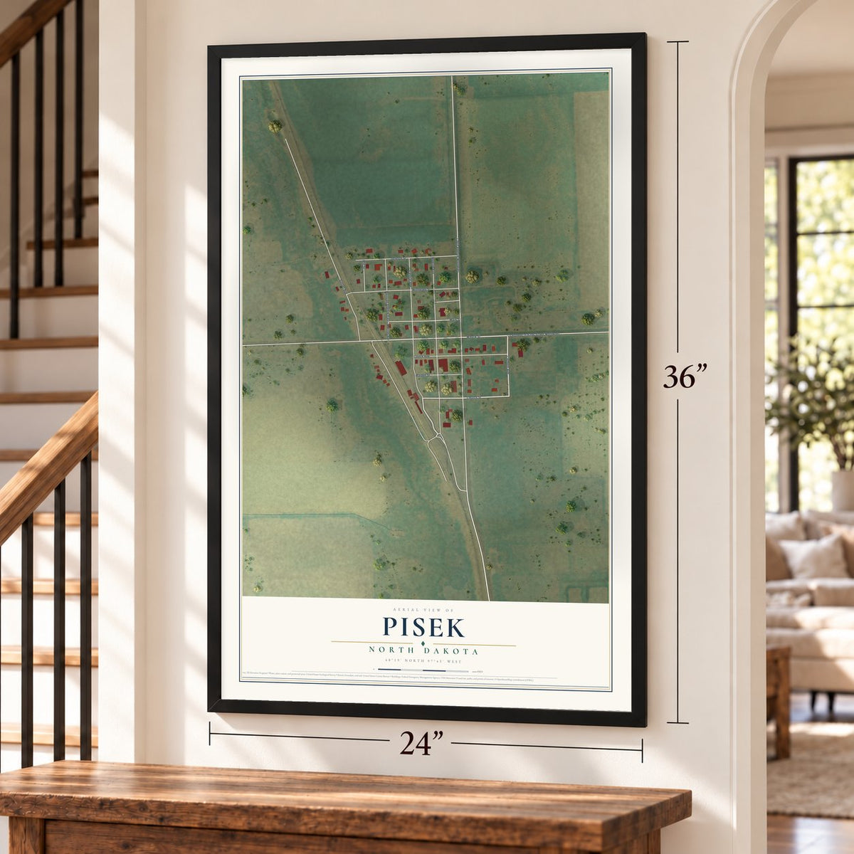 Pisek, North Dakota map, 24 x 36 inch print in a black frame by a staircase