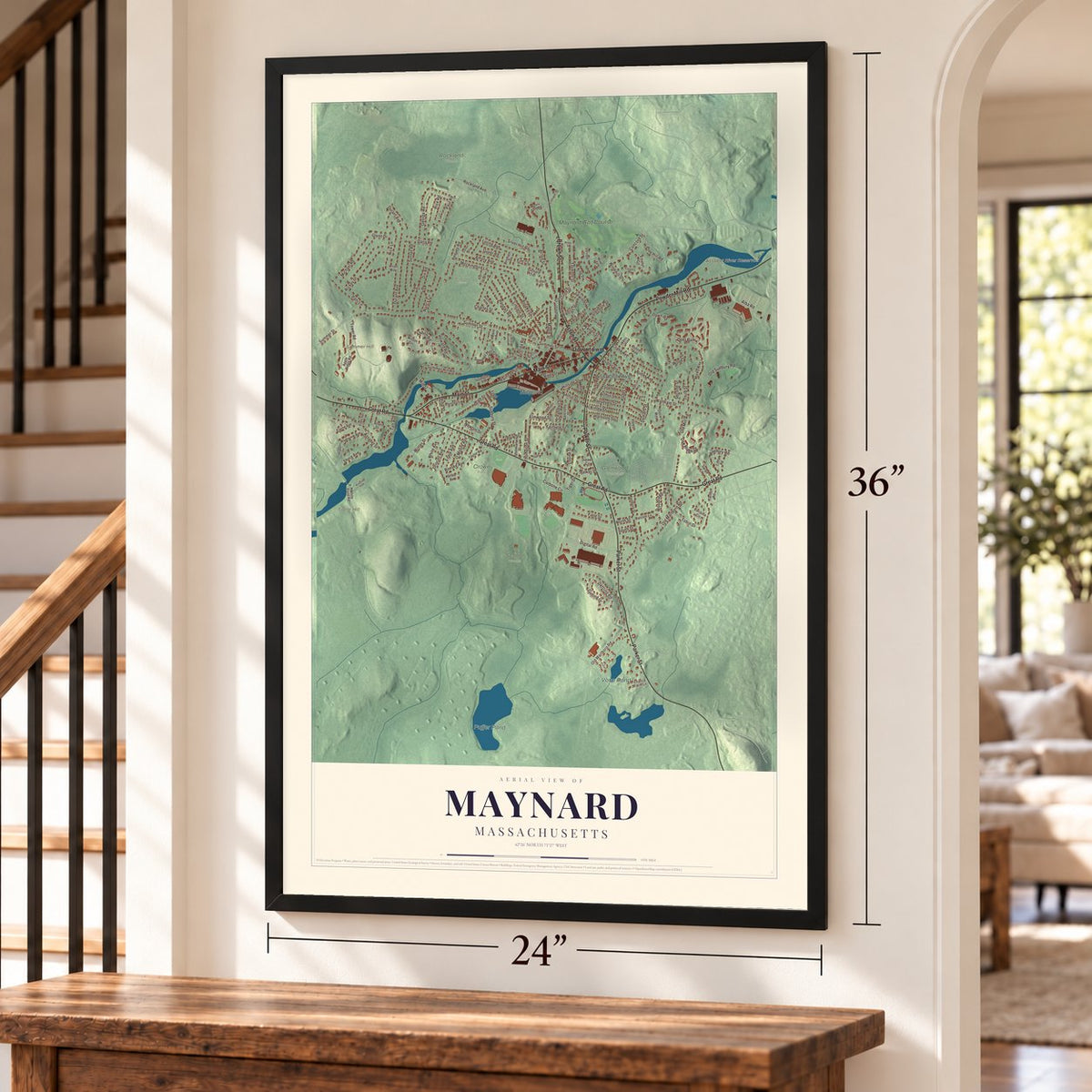 Maynard, Massachusetts map, 24 x 36 inch print in a black frame by a staircase