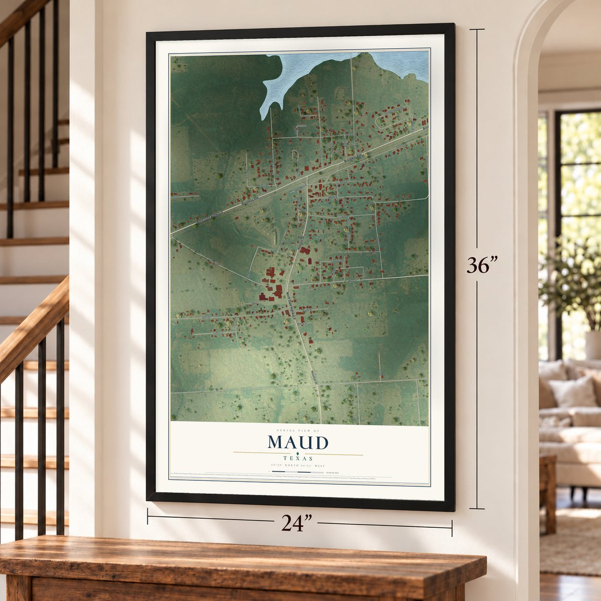 Maud, Texas map, 24 x 36 inch print in a black frame by a staircase