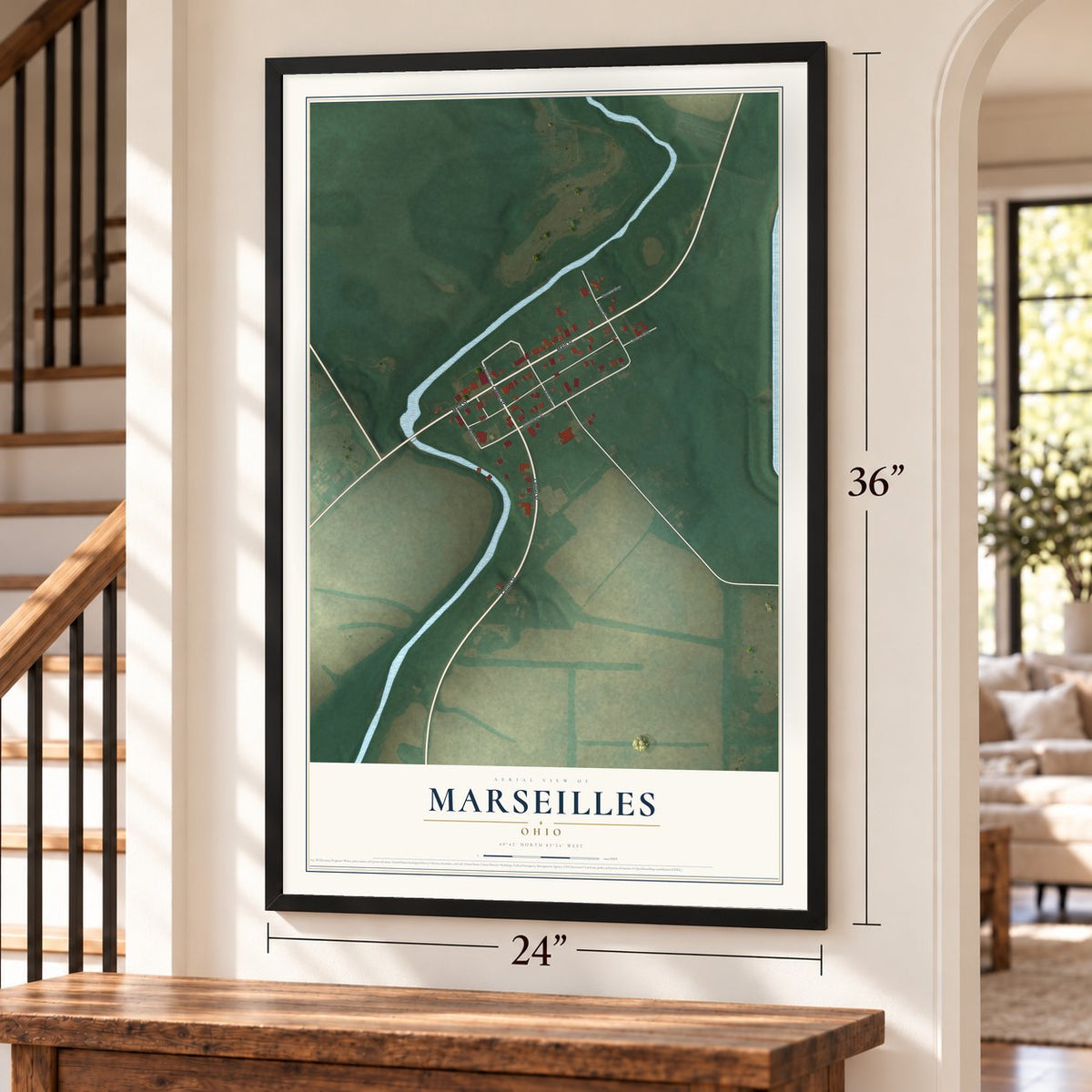 Marseilles, Ohio map, 24 x 36 inch print in a black frame by a staircase