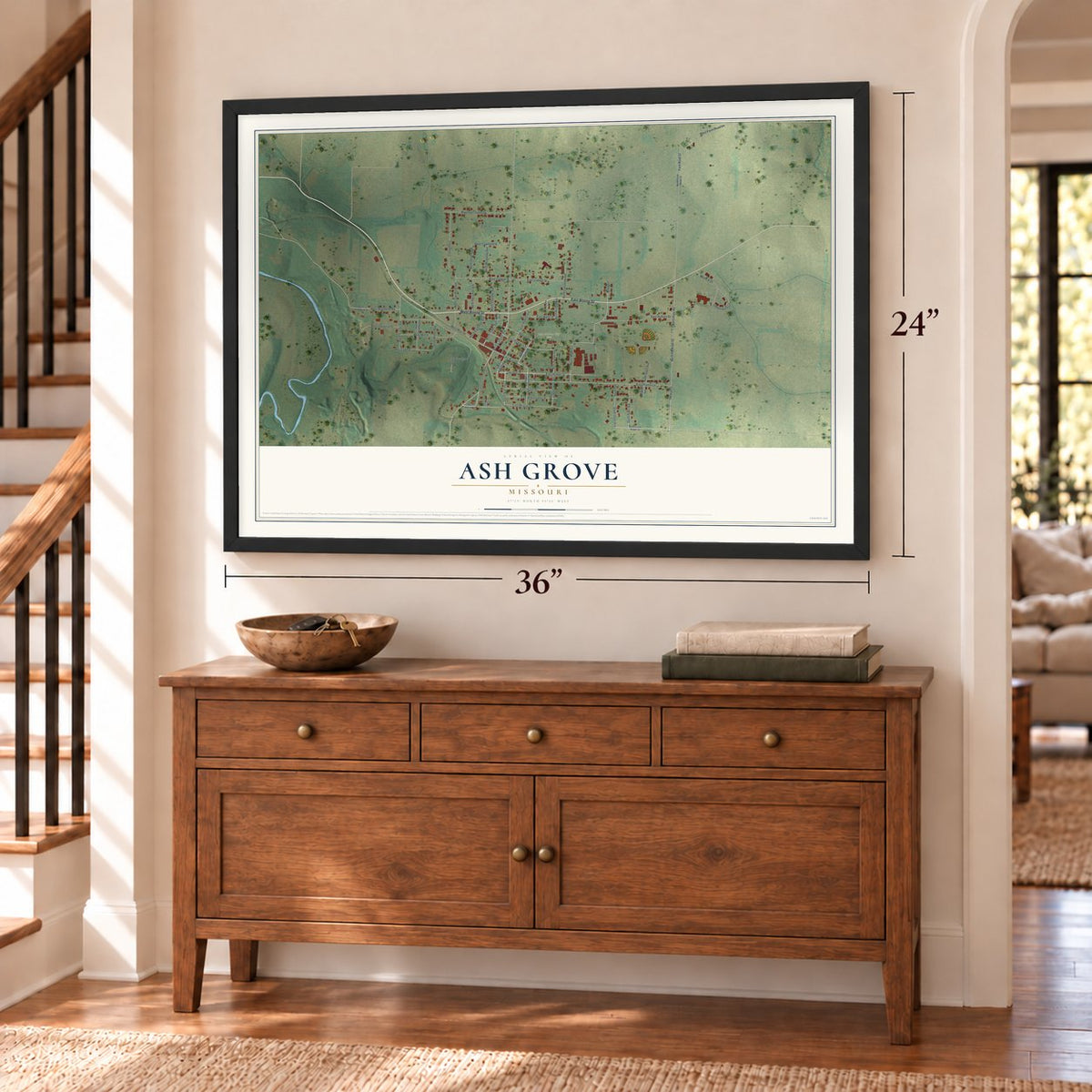 Ash Grove, Missouri map, 24 x 36 inch print in a black frame above a dresser by a staircase