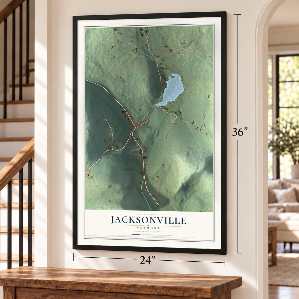 Jacksonville, Vermont map, 24 x 36 inch print in a black frame by a staircase