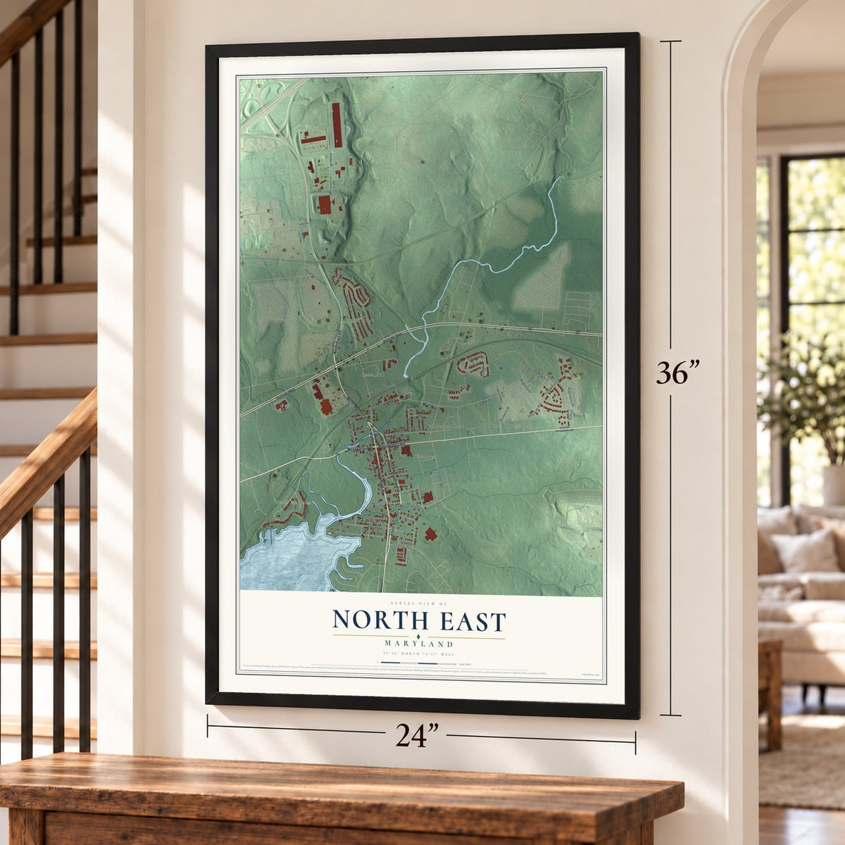 North East, Maryland map, 24 x 36 inch print in a black frame by a staircase