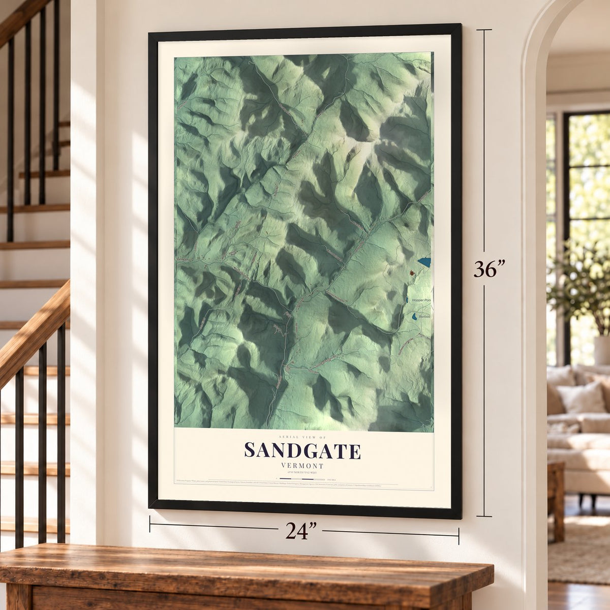 Sandgate, Vermont map, 24 x 36 inch print in a black frame by a staircase