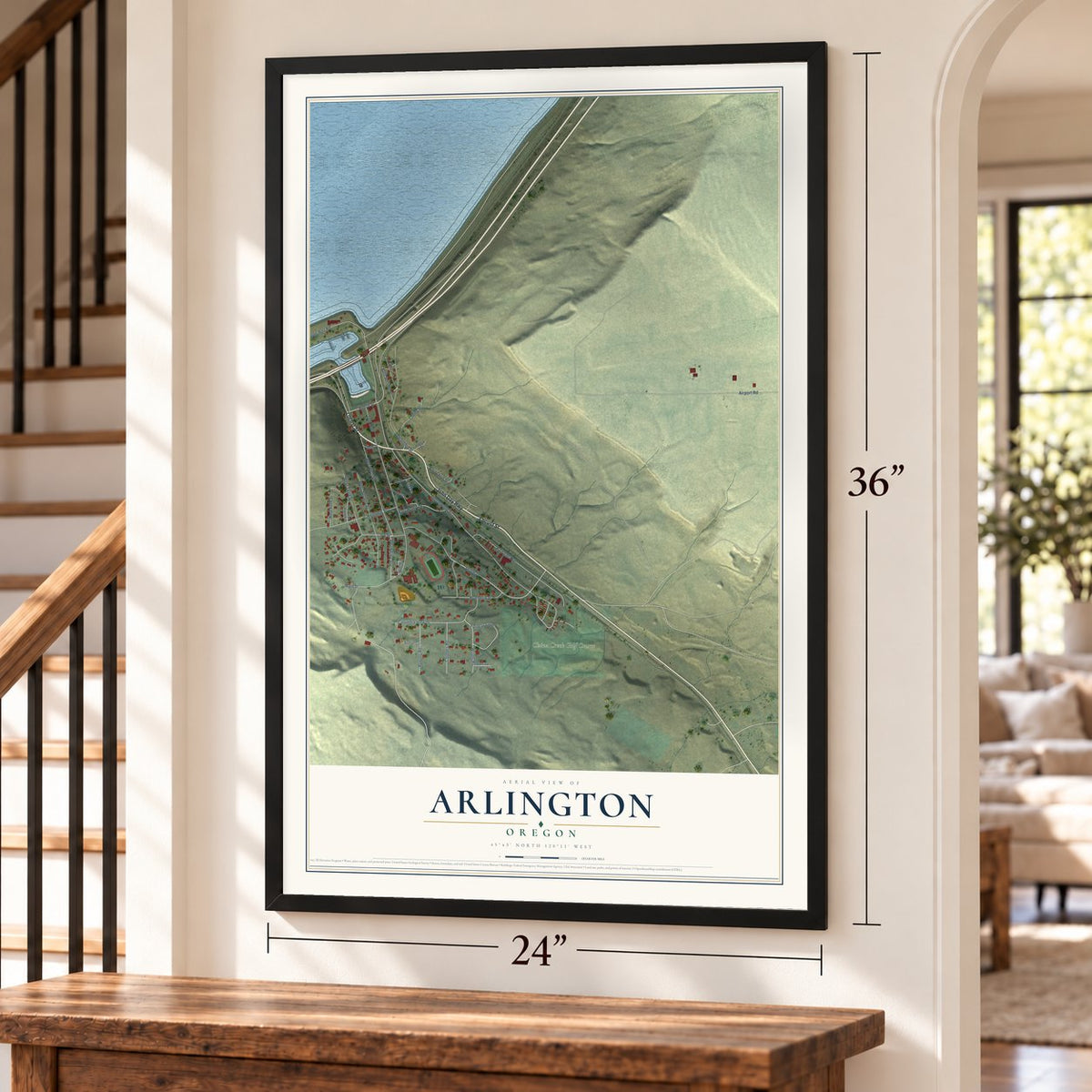 Arlington, Oregon map, 24 x 36 inch print in a black frame by a staircase