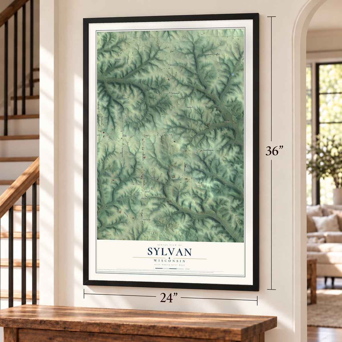 Sylvan, Wisconsin map, 24 x 36 inch print in a black frame by a staircase