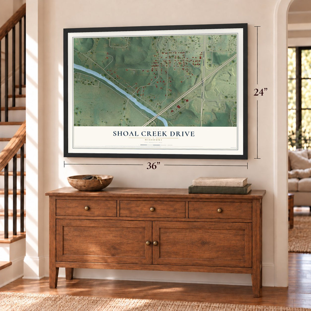 Shoal Creek Drive, Missouri map, 24 x 36 inch print in a black frame above a dresser by a staircase