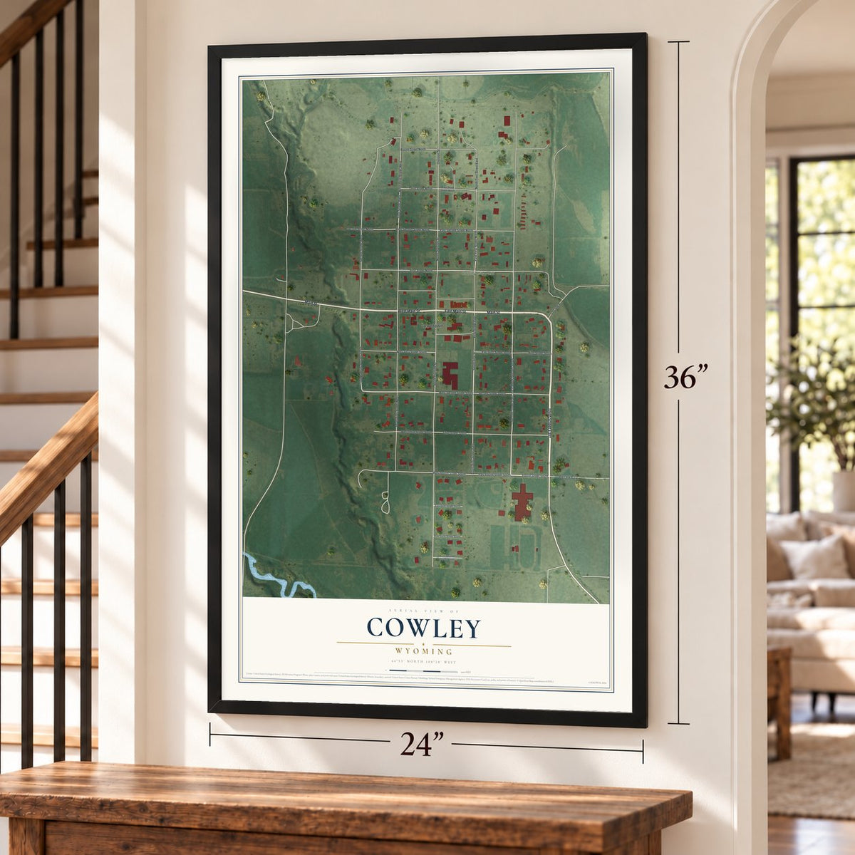 Cowley, Wyoming map, 24 x 36 inch print in a black frame by a staircase