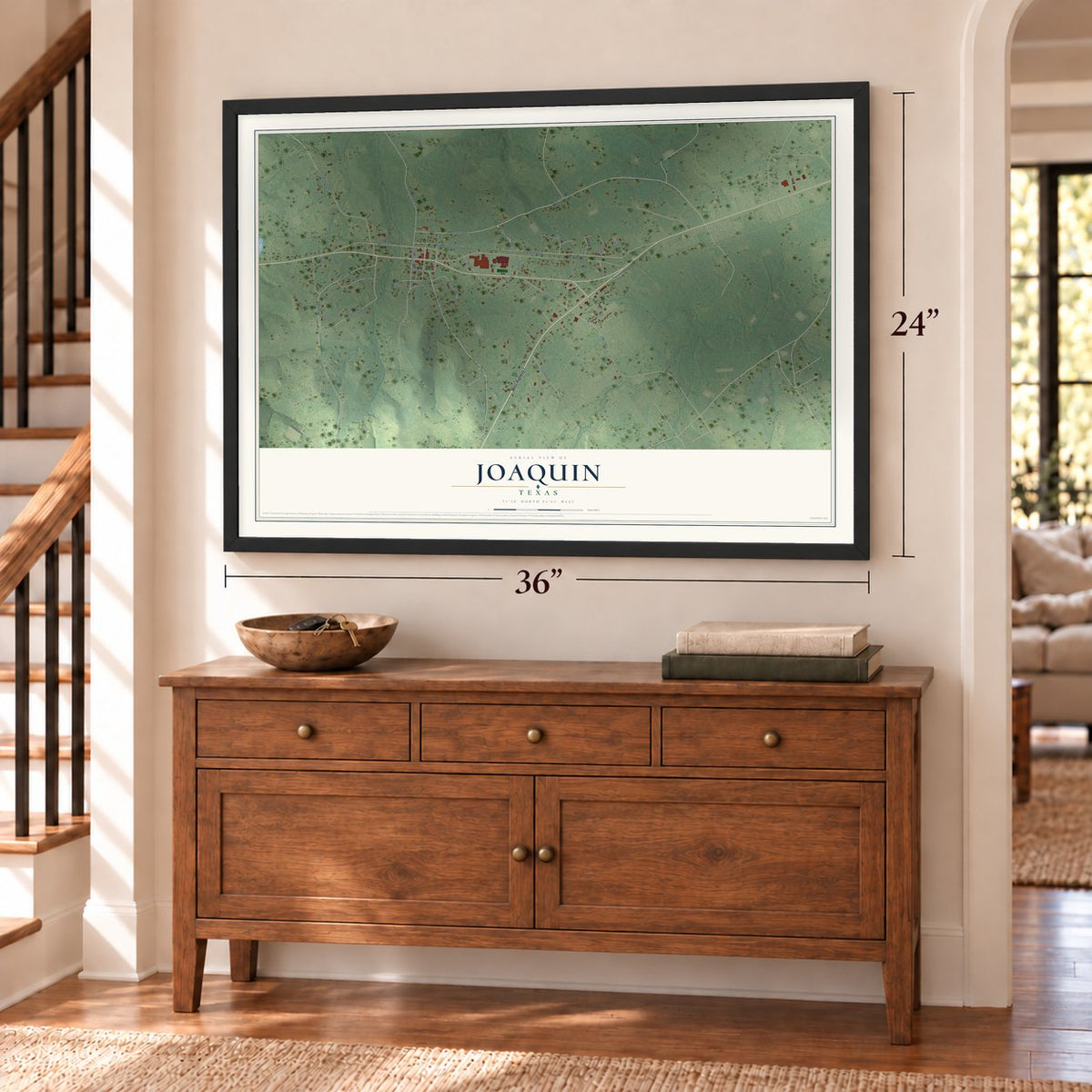 Joaquin, Texas map, 24 x 36 inch print in a black frame above a dresser by a staircase