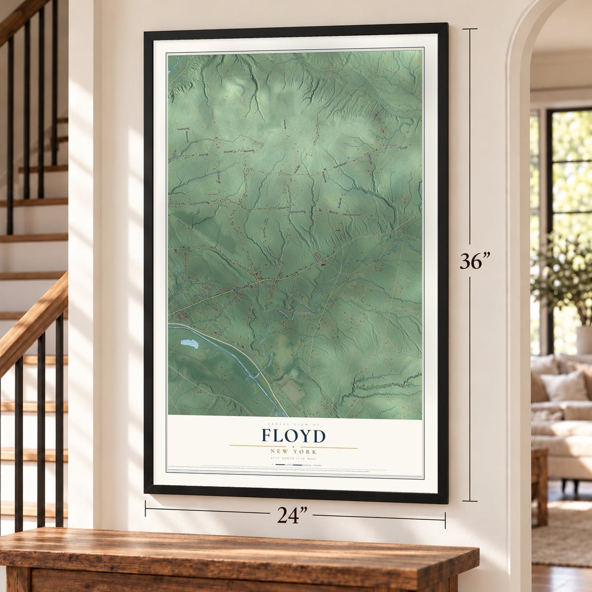 Floyd, New York map, 24 x 36 inch print in a black frame by a staircase