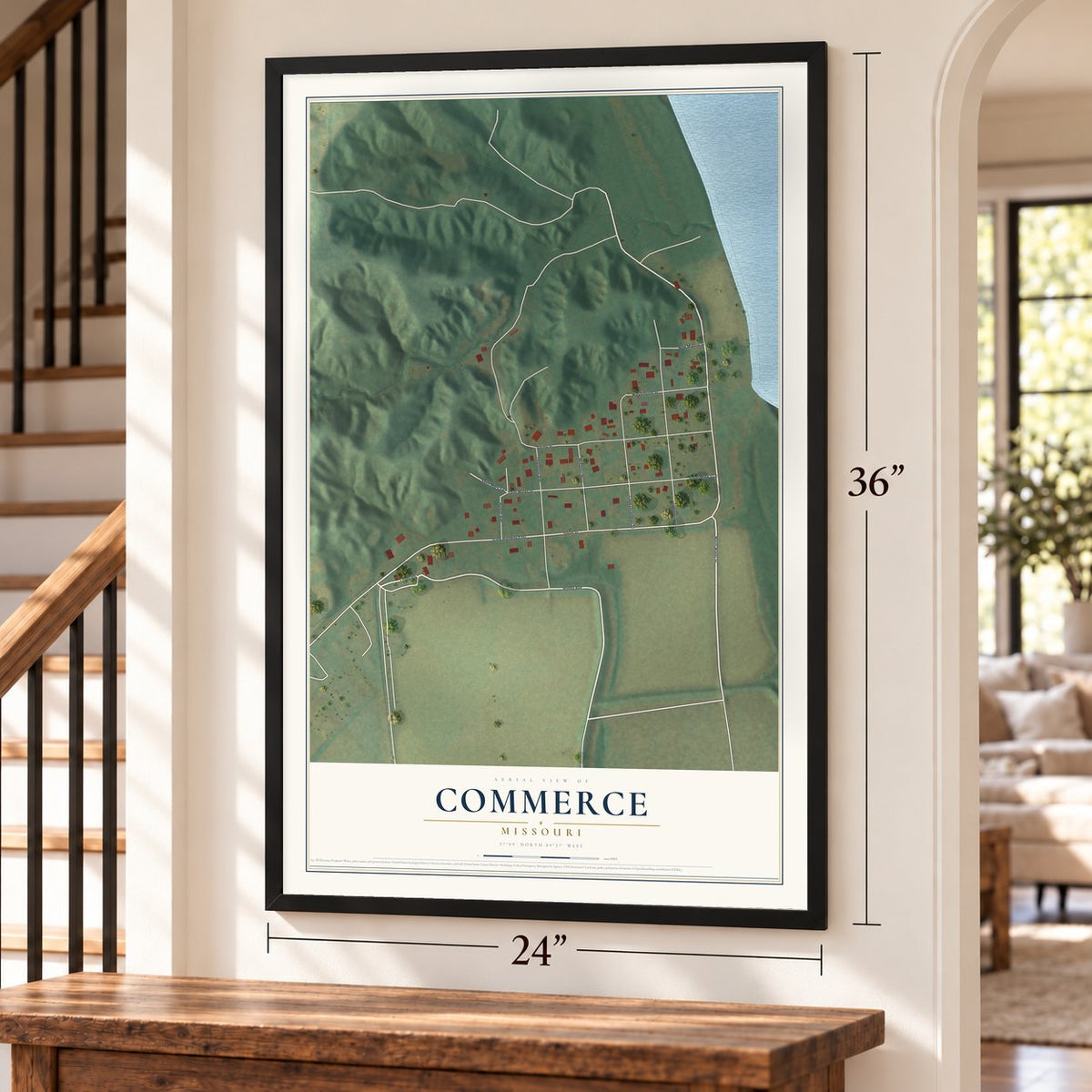 Commerce, Missouri map, 24 x 36 inch print in a black frame by a staircase