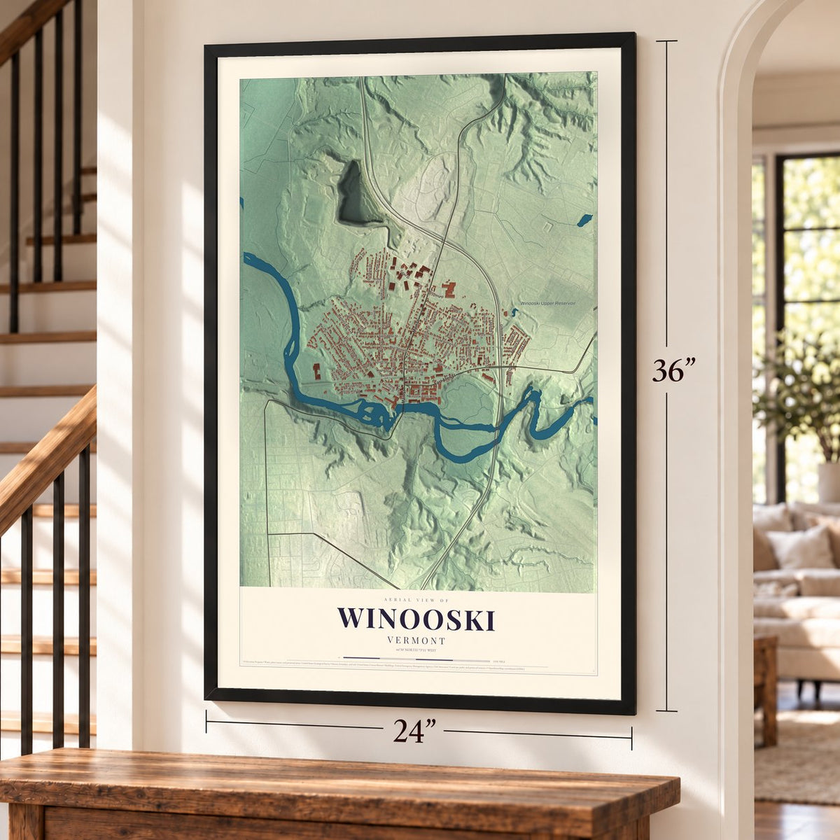 Winooski, Vermont map, 24 x 36 inch print in a black frame by a staircase