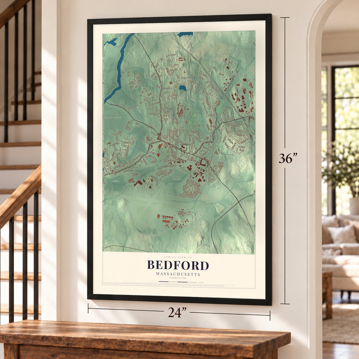 Bedford, Massachusetts map, 24 x 36 inch print in a black frame by a staircase