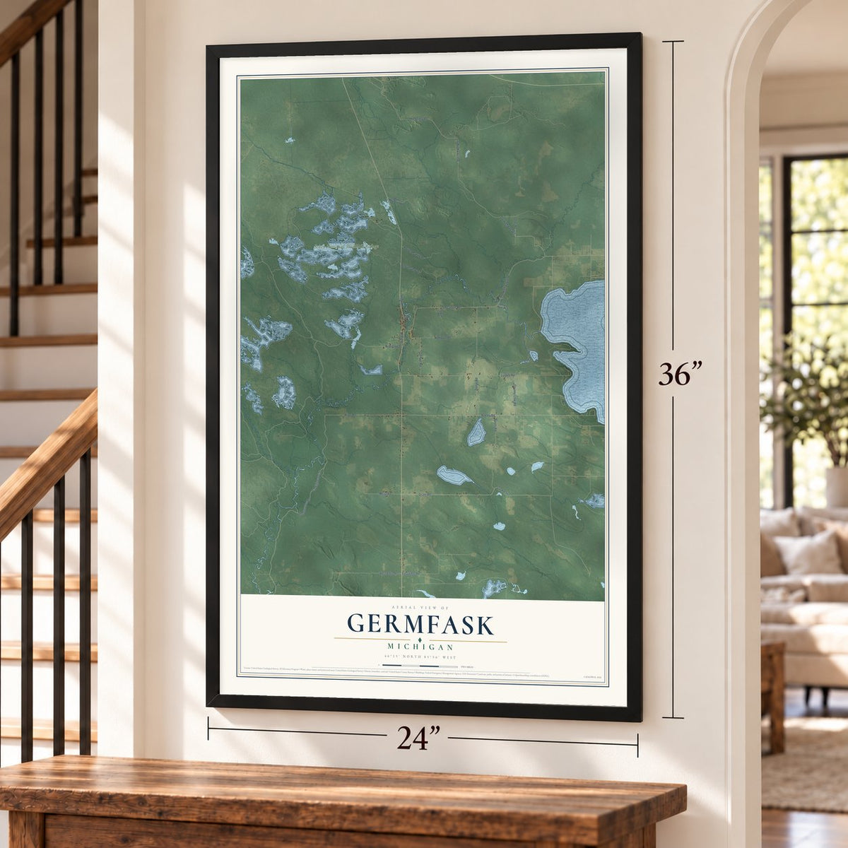 Germfask, Michigan map, 24 x 36 inch print in a black frame by a staircase