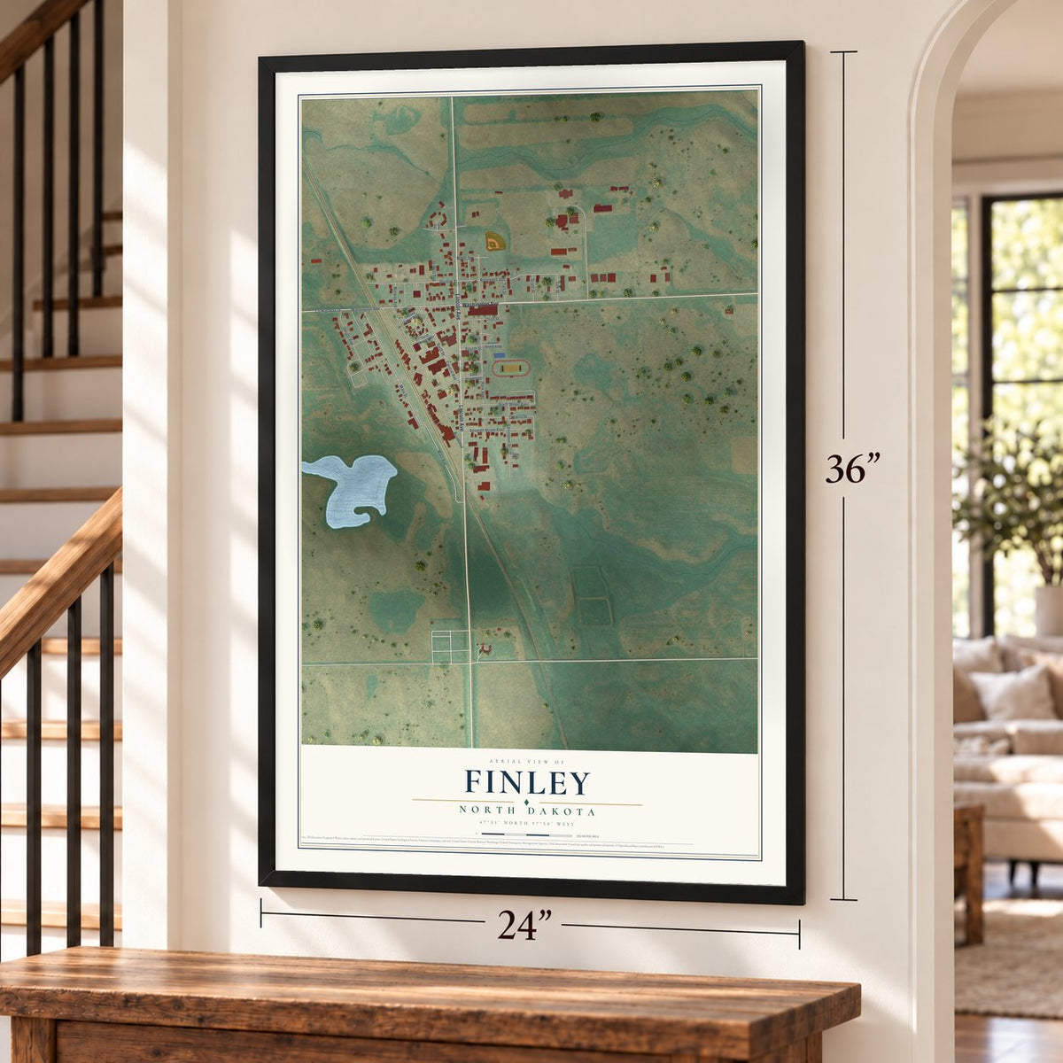Finley, North Dakota map, 24 x 36 inch print in a black frame by a staircase