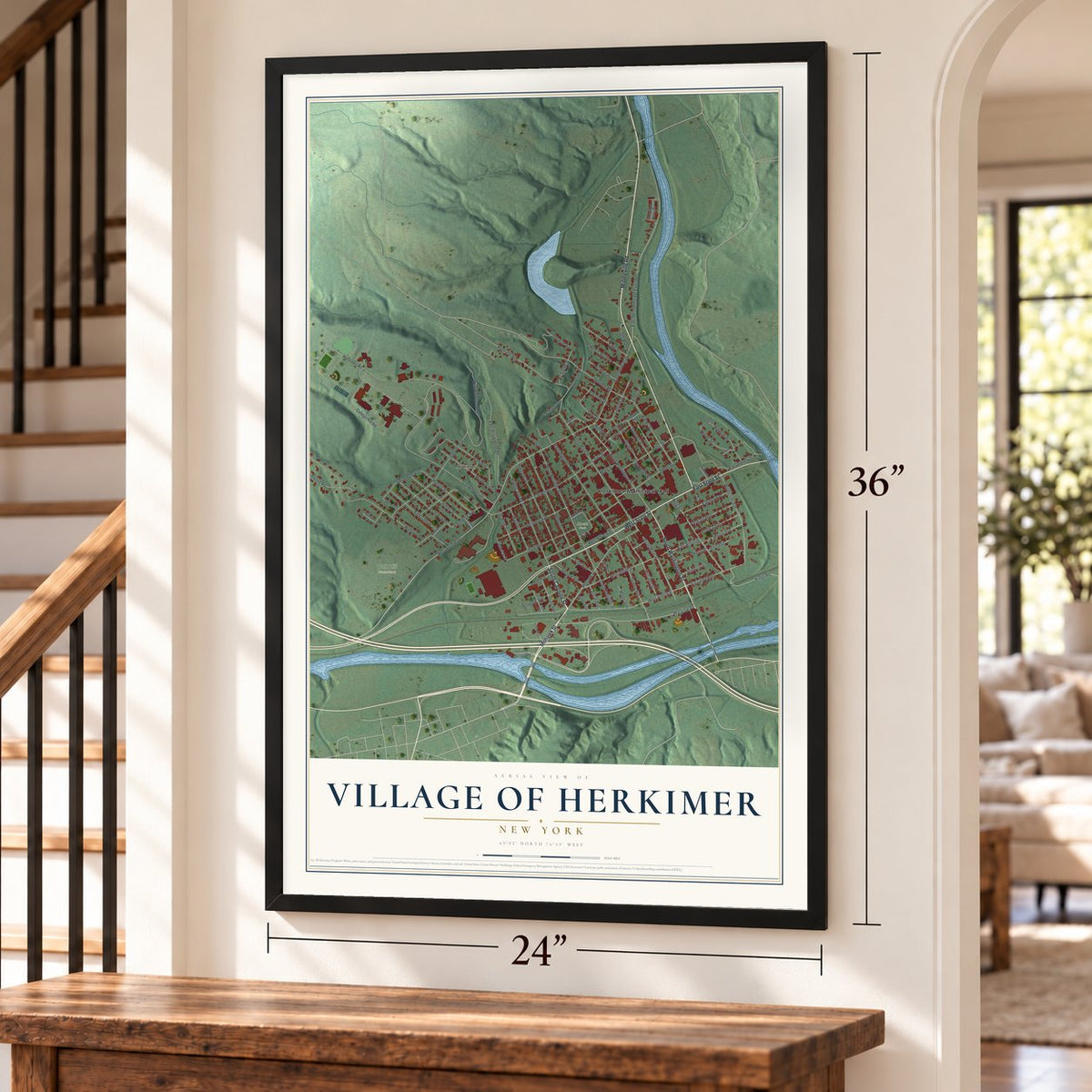 Village of Herkimer, New York map, 24 x 36 inch print in a black frame by a staircase