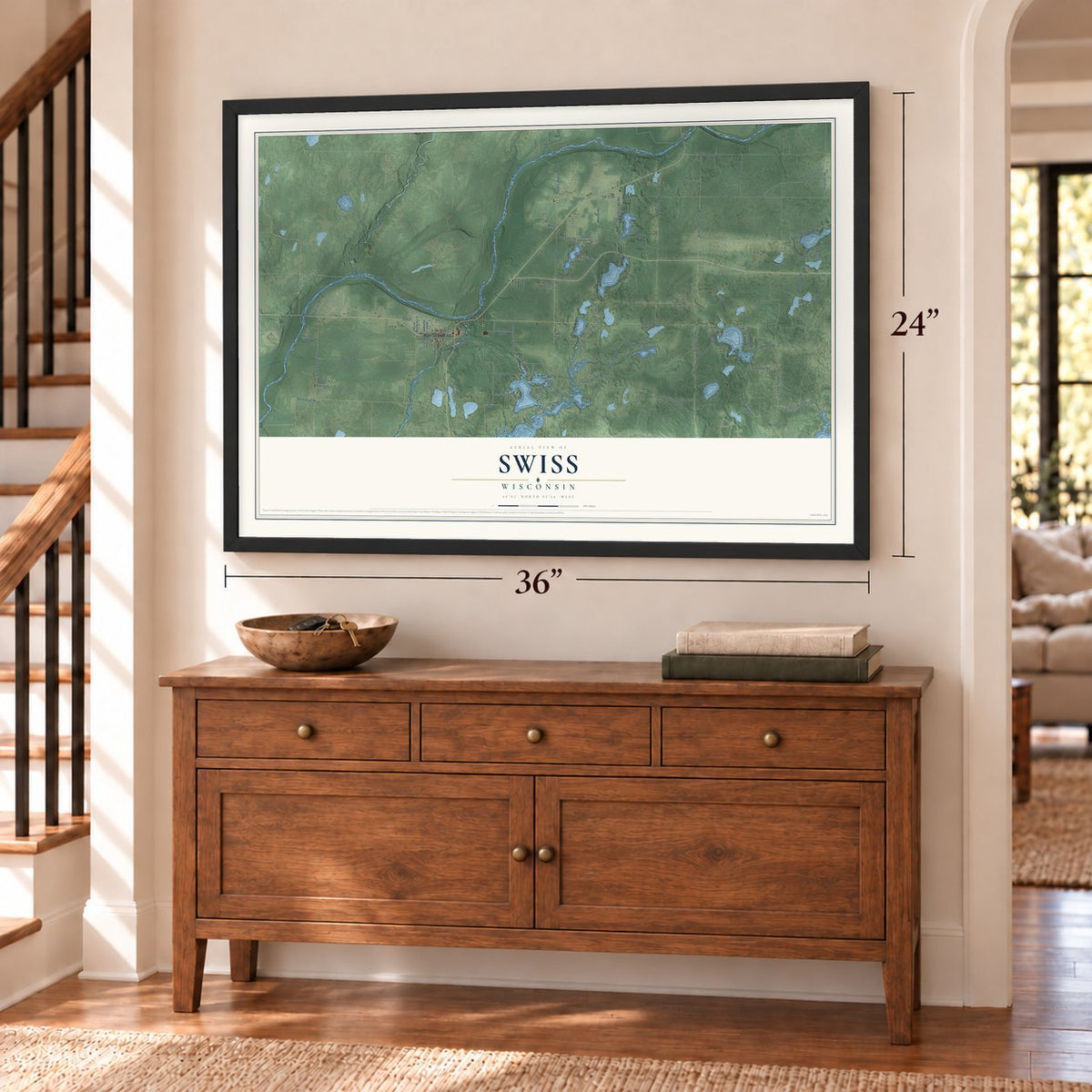 Swiss, Wisconsin map, 24 x 36 inch print in a black frame above a dresser by a staircase