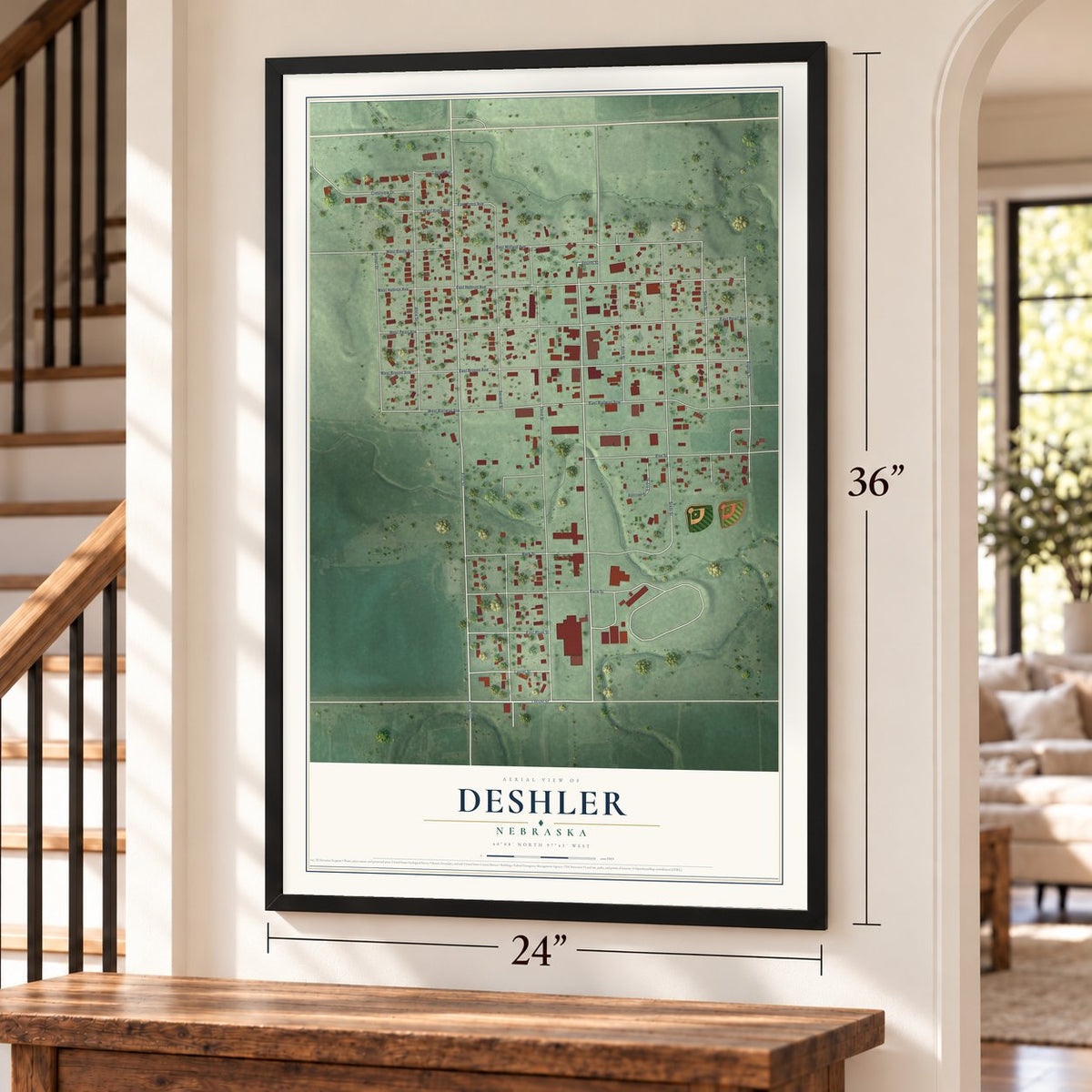 Deshler, Nebraska map, 24 x 36 inch print in a black frame by a staircase