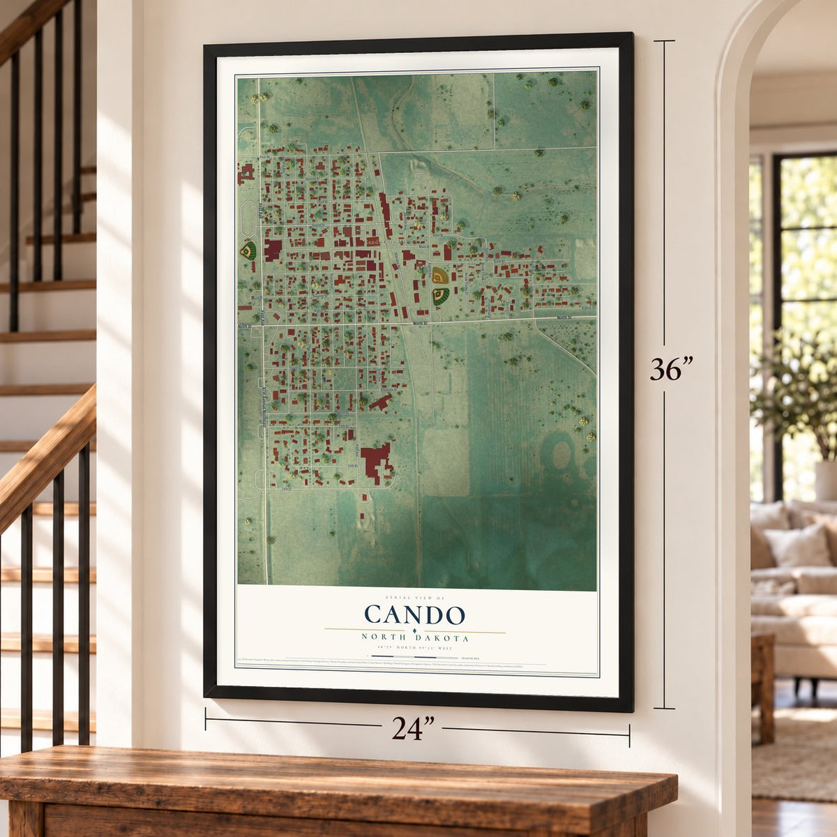 Cando, North Dakota map, 24 x 36 inch print in a black frame by a staircase
