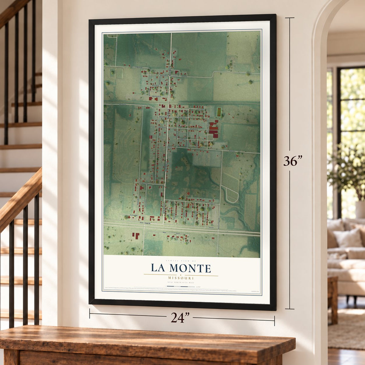 La Monte, Missouri map, 24 x 36 inch print in a black frame by a staircase