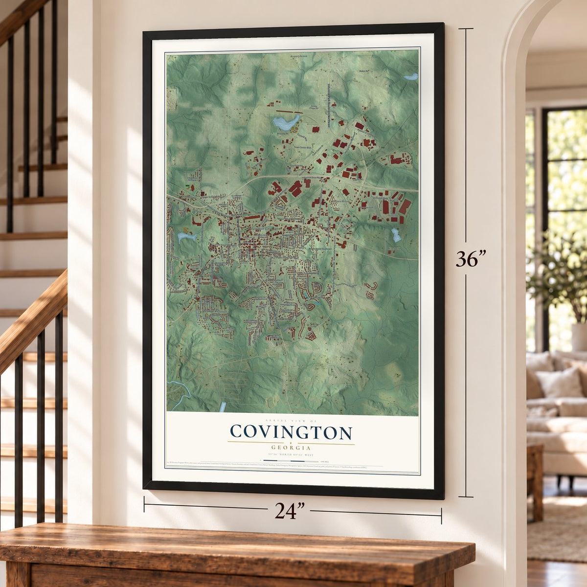 Covington, Georgia map, 24 x 36 inch print in a black frame by a staircase