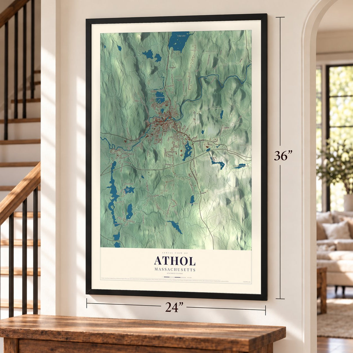 Athol, Massachusetts map, 24 x 36 inch print in a black frame by a staircase