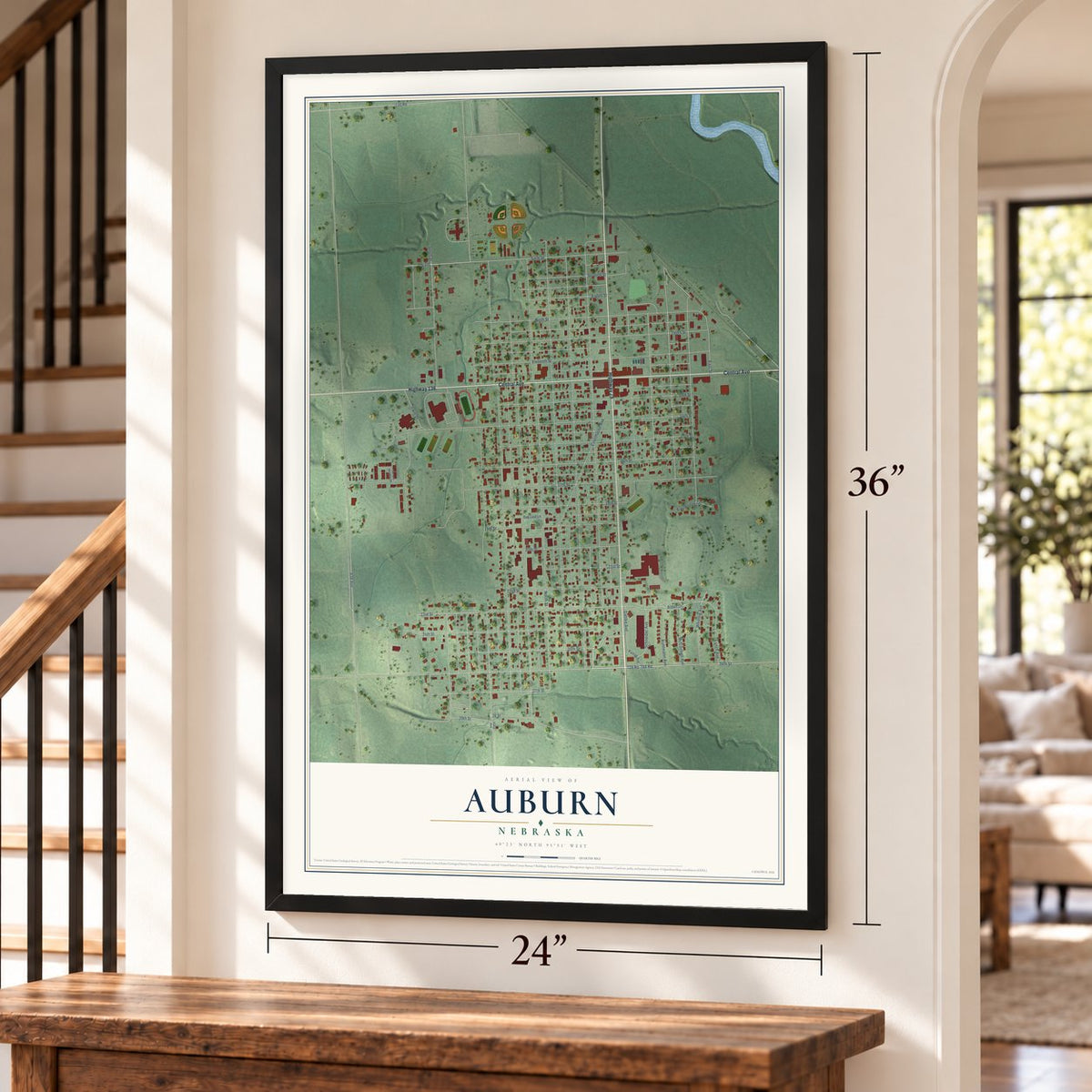 Auburn, Nebraska map, 24 x 36 inch print in a black frame by a staircase