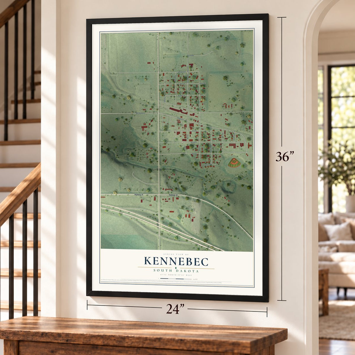 Kennebec, South Dakota map, 24 x 36 inch print in a black frame by a staircase