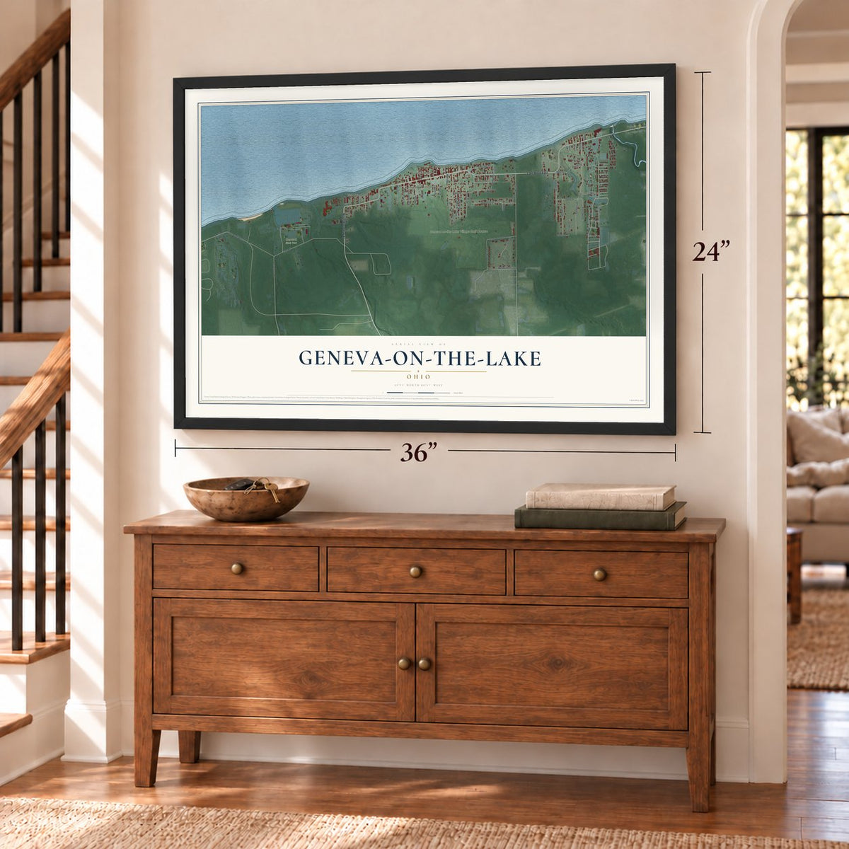 Geneva-on-the-Lake, Ohio map, 24 x 36 inch print in a black frame above a dresser by a staircase