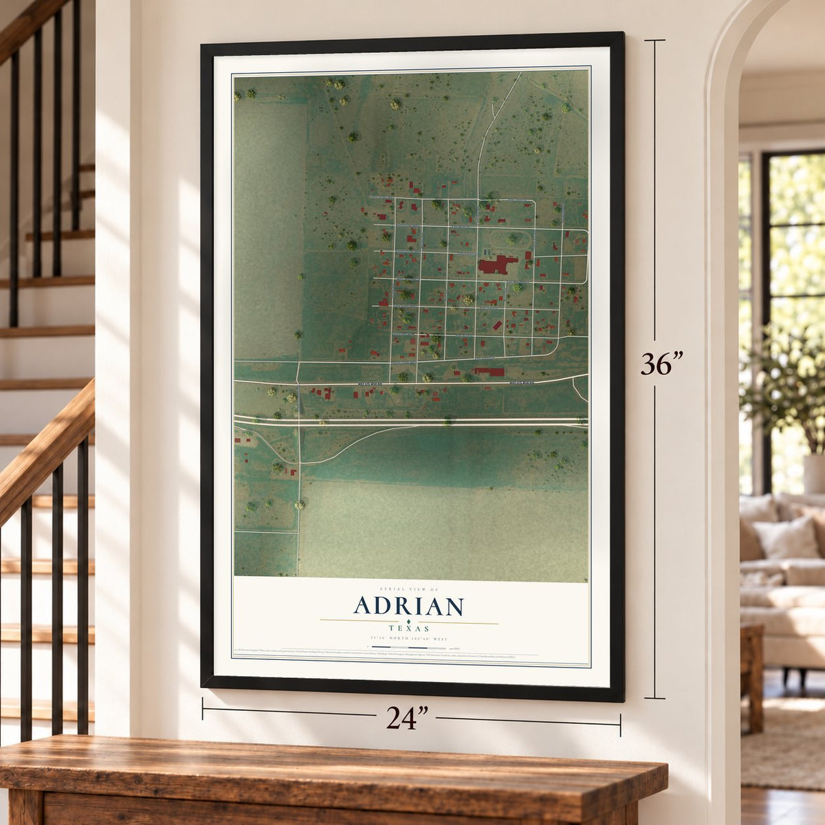 Adrian, Texas map, 24 x 36 inch print in a black frame by a staircase