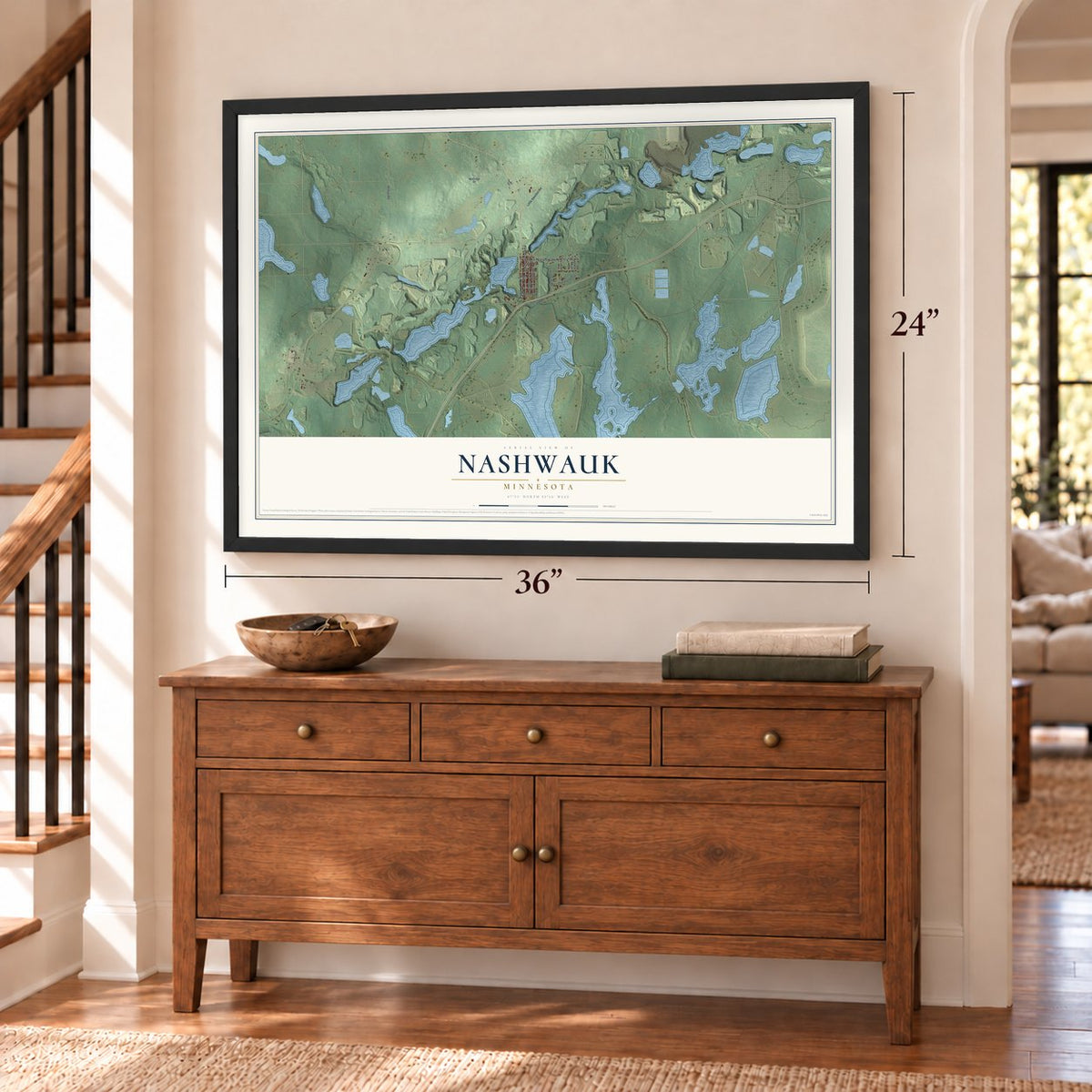 Nashwauk, Minnesota map, 24 x 36 inch print in a black frame above a dresser by a staircase