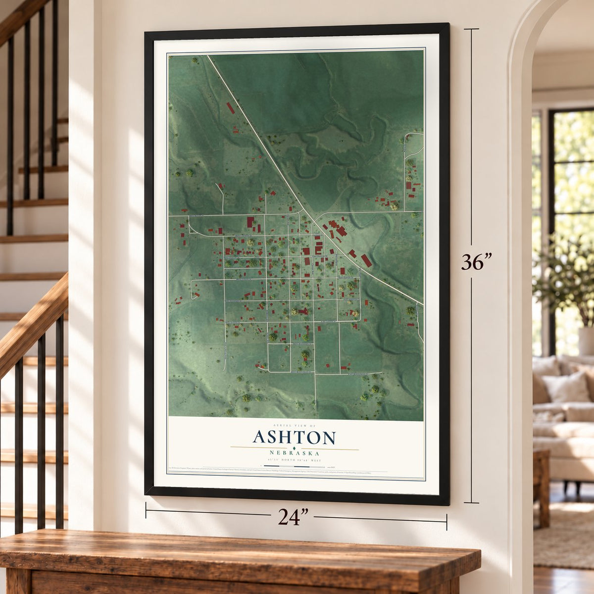Ashton, Nebraska map, 24 x 36 inch print in a black frame by a staircase